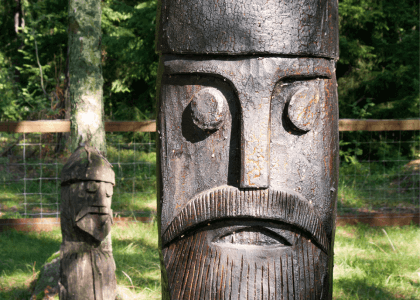 wooden viking carving of thor