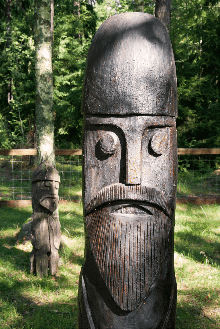 wooden viking carving of thor