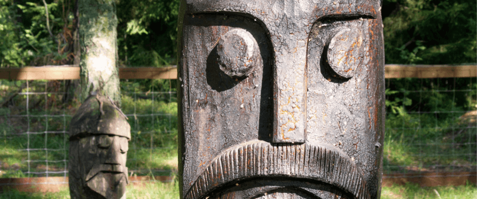 wooden viking carving of thor