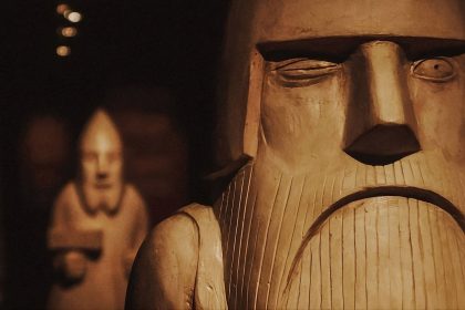 stone sculpture of odin
